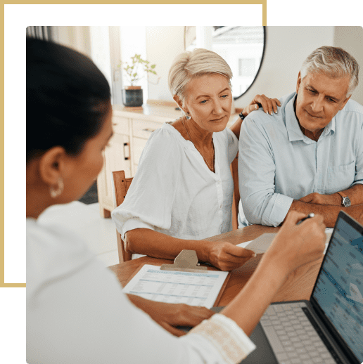 Senior couple meeting with financial advisor.