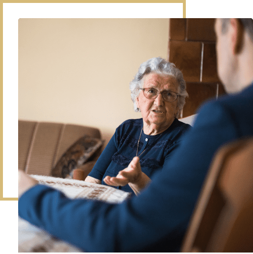 48 A man sitting on the couch talking to someone